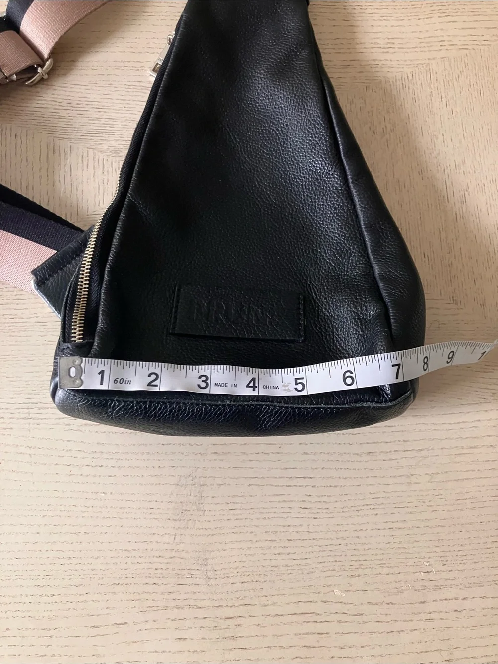 Prüne Black Leather Sling Backpack with Tan/Beige and Black Strap